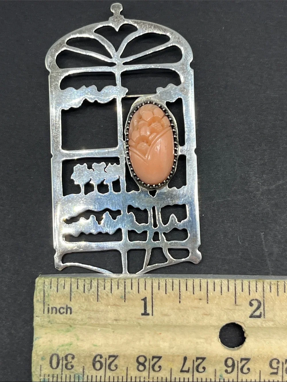 Vintage art nouveau sterling silver brooch with floral carving